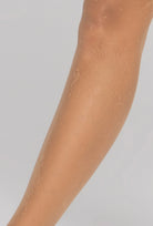 Beżowe rajstopy z kwiatowym wzorem Garden z kolekcji Zień x Gatta