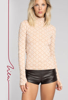 Beżowy golf Monogram z kolekcji Zień x Gatta